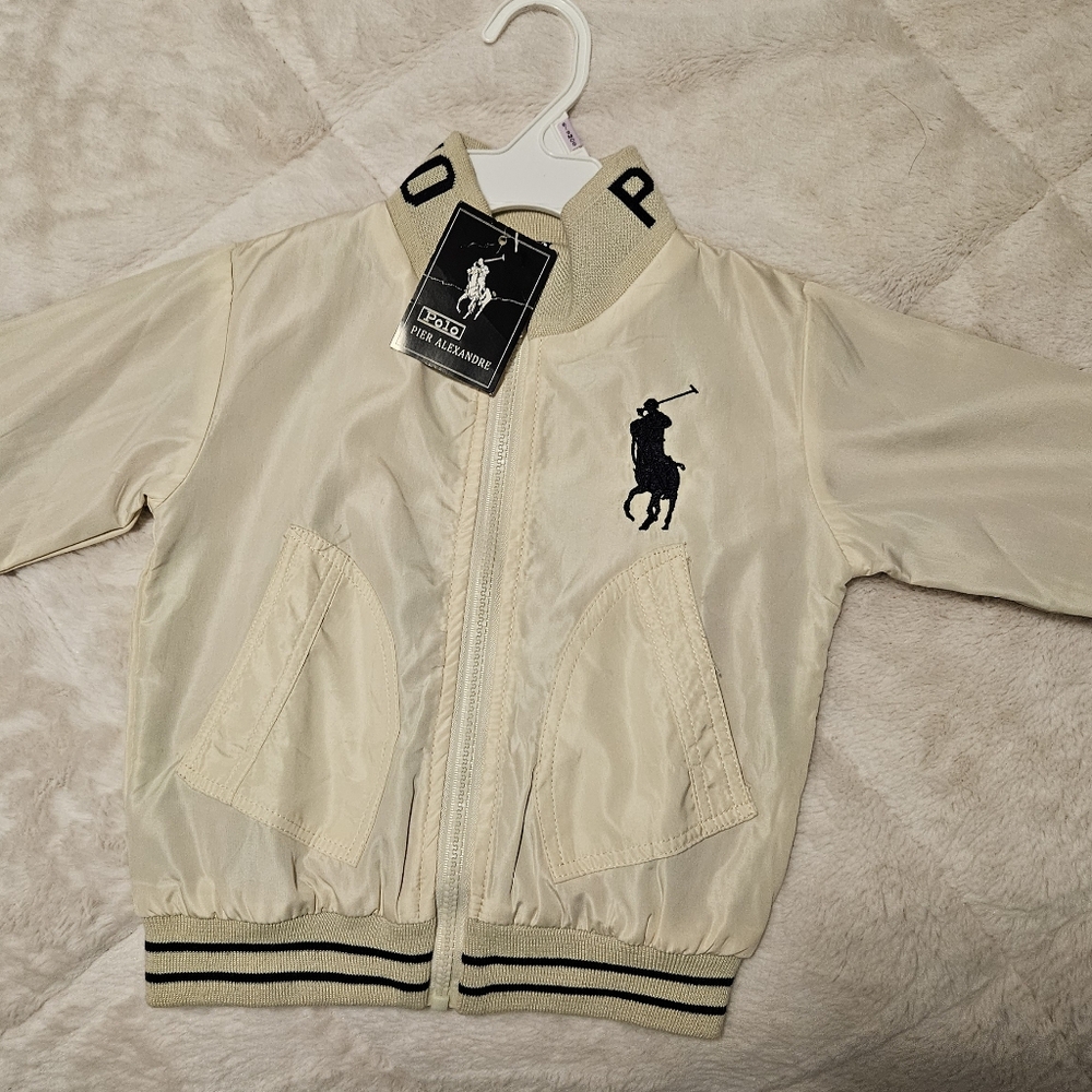 Matching set for 6 to 9 months old boy. Never worn polo brand